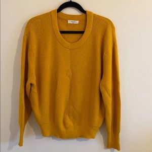 Womans crew neck sweater.